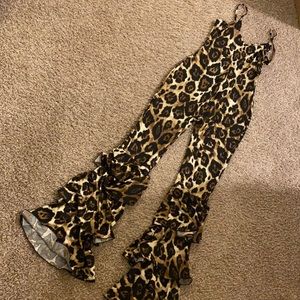 Leopard print jumpsuit with ruffles. Worn once
